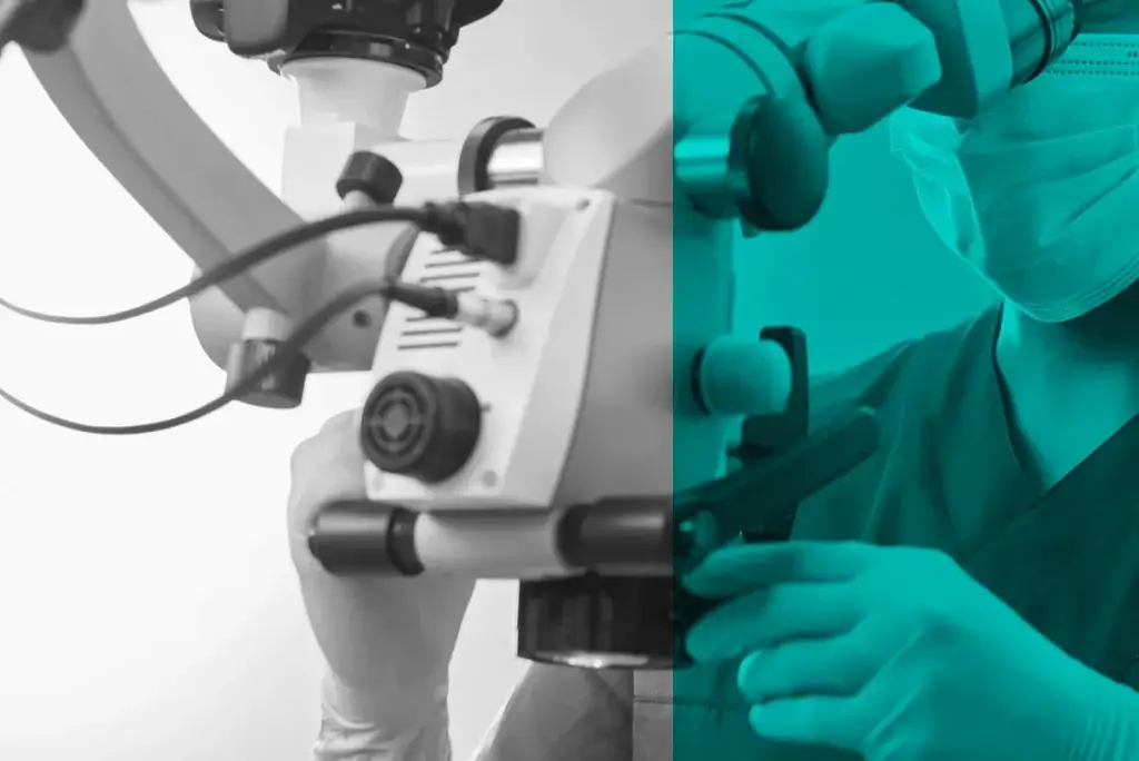Zahnarzt schaut durch Mikroskop während der Wurzelbehandlung in Simmern